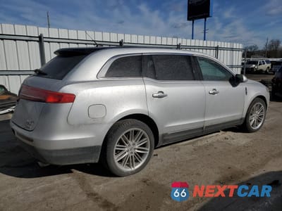 Trzecie zdjęcie samochodu z tyłu: 2014 LINCOLN MKT VIN:2LMHJ5AT4EBL58245 - miniatura