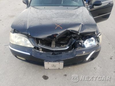 Zdjęcie 12 z 14 samochodu: 2004 ACURA 3.5RL VIN:JH4KA96694C005853 - miniatura