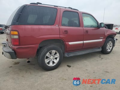 Trzecie zdjęcie samochodu z tyłu: 2002 GMC YUKON VIN:1GKEC13T02R245117 - miniatura