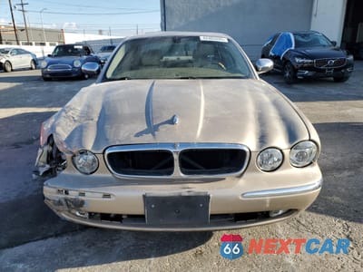 Piąte zdjęcie samochodu w środku: 2004 JAGUAR VANDENPLAS VIN:SAJEA74C84SG03857 - miniatura