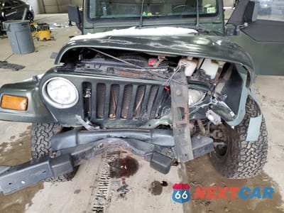 Zdjęcie 11 z 12 samochodu: 1997 JEEP WRANGLER / TJ SPORT VIN:1J4FY19S8VP545479 - miniatura