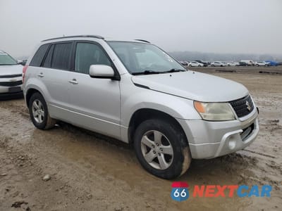 Czwarte zdjęcie samochodu z boku: 2010 SUZUKI GRAND VITARA XSPORT VIN:JS3TE0D4XA4100761 - miniatura