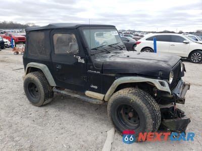 Czwarte zdjęcie samochodu z boku: 1999 JEEP WRANGLER / TJ SE VIN:1J4FY29PXXP482454 - miniatura