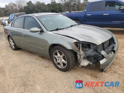 Czwarte zdjęcie samochodu z boku: 2002 NISSAN ALTIMA SE VIN:1N4BL11D42C199455 - miniatura