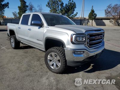 Czwarte zdjęcie samochodu z boku: 2018 GMC SIERRA K1500 SLT VIN:3GTU2NEJ6JG282541 - miniatura