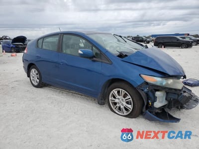 Czwarte zdjęcie samochodu z boku: 2011 HONDA INSIGHT EX VIN:JHMZE2H76BS000127 - miniatura