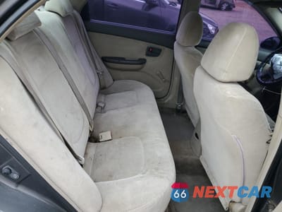 Zdjęcie 10 z 15 samochodu: 2005 KIA SPECTRA LX VIN:KNAFE121755180138 - miniatura