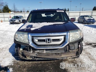 Piąte zdjęcie samochodu w środku: 2011 HONDA PILOT EXL VIN:5FNYF4H59BB097003 - miniatura
