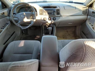 Zdjęcie 8 z 12 samochodu: 2002 TOYOTA CAMRY LE VIN:4T1BE32K52U015708 - miniatura