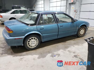 Trzecie zdjęcie samochodu z tyłu: 1995 SATURN SL2 VIN:1G8ZK5274SZ290163 - miniatura