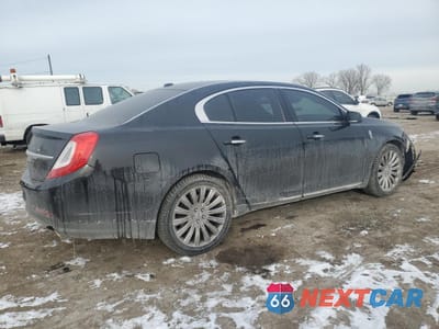 Trzecie zdjęcie samochodu z tyłu: 2015 LINCOLN MKS VIN:1LNHL9EK3FG607885 - miniatura