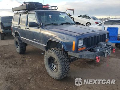 Czwarte zdjęcie samochodu z boku: 2001 JEEP CHEROKEE SPORT VIN:1J4FF48S31L615819 - miniatura