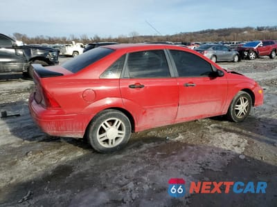 Trzecie zdjęcie samochodu z tyłu: 2000 FORD FOCUS SE VIN:1FAFP34P8YW289920 - miniatura