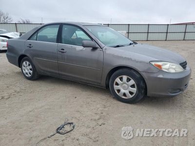 Czwarte zdjęcie samochodu z boku: 2002 TOYOTA CAMRY LE VIN:4T1BE32K42U532594 - miniatura