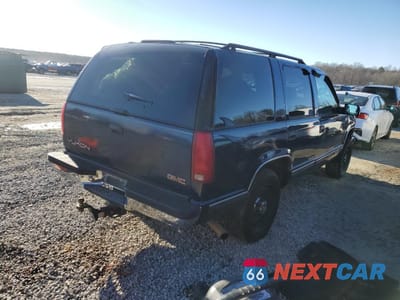 Trzecie zdjęcie samochodu z tyłu: 1998 GMC YUKON VIN:1GKEK13R5WJ712124 - miniatura