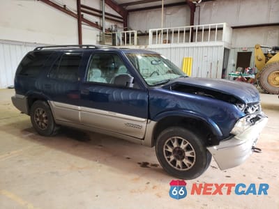 Czwarte zdjęcie samochodu z boku: 1999 GMC JIMMY VIN:1GKDT13WXX2539100 - miniatura
