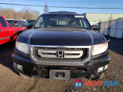 Piąte zdjęcie samochodu w środku: 2011 HONDA RIDGELINE RTL VIN:5FPYK1F53BB008370 - miniatura