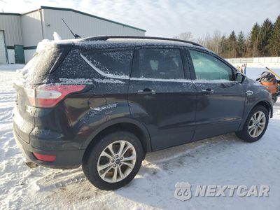 Trzecie zdjęcie samochodu z tyłu: 2018 FORD ESCAPE SE VIN:1FMCU9GD4JUC12663 - miniatura