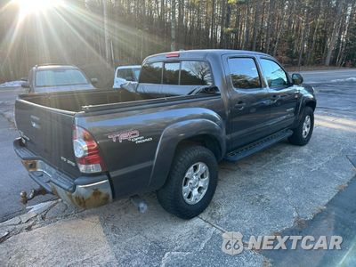 Czwarte zdjęcie samochodu z boku: 2009 TOYOTA TACOMA DOUBLE CAB VIN:3TMLU42N19M032726 - miniatura