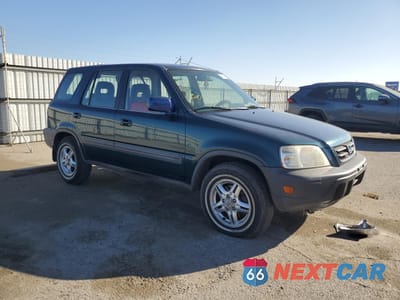 Czwarte zdjęcie samochodu z boku: 1999 HONDA CR-V LX VIN:JHLRD2844XC010900 - miniatura