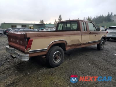 Trzecie zdjęcie samochodu z tyłu: 1986 FORD F250 VIN:1FTHX25L0GKA40803 - miniatura