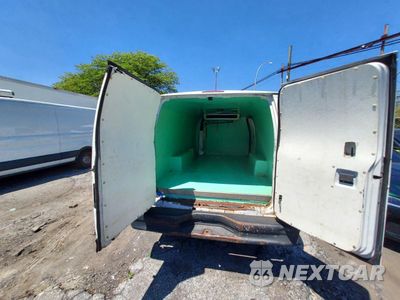 Trzecie zdjęcie samochodu z tyłu: 2014 FORD ECONOLINE E350 SUPER DUTY VAN VIN:1FTSS3EL8EDA02280 - miniatura