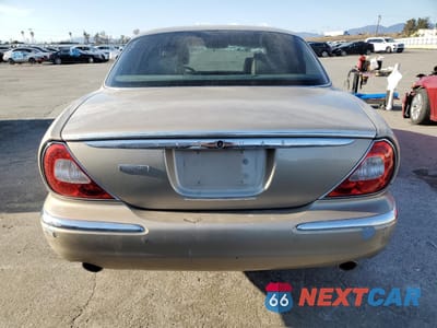 Zdjęcie 6 z 12 samochodu: 2004 JAGUAR VANDENPLAS VIN:SAJEA74C84SG03857 - miniatura