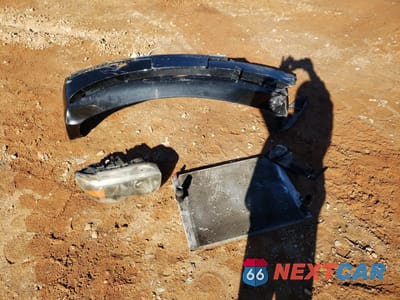 Zdjęcie 14 z 15 samochodu: 2005 BMW 745 LI VIN:WBAGN63595DS59870 - miniatura