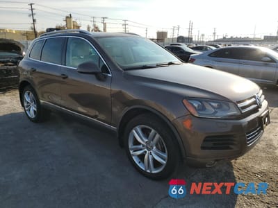Czwarte zdjęcie samochodu z boku: 2012 VOLKSWAGEN TOUAREG V6 TDI VIN:WVGEK9BP0CD007182 - miniatura