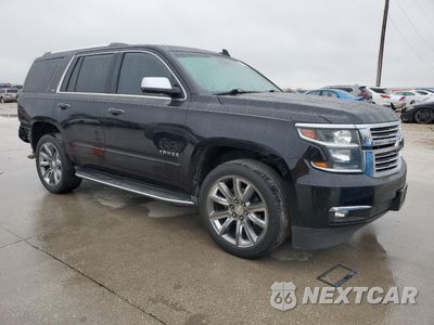 Czwarte zdjęcie samochodu z boku: 2015 CHEVROLET TAHOE C1500 LTZ VIN:1GNSCCKCXFR743690 - miniatura