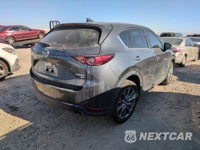 Trzecie zdjęcie samochodu z tyłu: 2021 MAZDA CX-5 SIGNATURE VIN:JM3KFBEY3M0319729 - miniatura