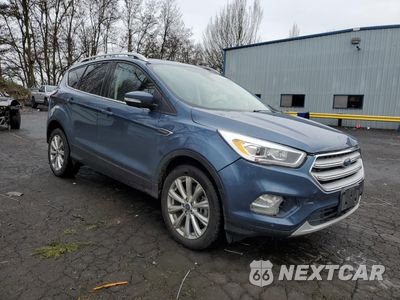 Czwarte zdjęcie samochodu z boku: 2018 FORD ESCAPE TITANIUM VIN:1FMCU9J95JUB26590 - miniatura