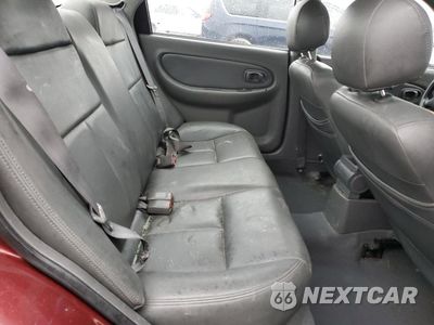 Zdjęcie 10 z 12 samochodu: 2003 KIA SPECTRA BASE VIN:KNAFB121335215523 - miniatura