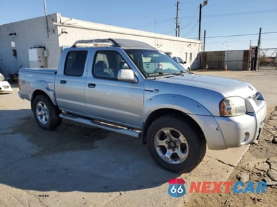 Czwarte zdjęcie samochodu z boku: 2001 NISSAN FRONTIER CREW CAB SC VIN:1N6MD27T91C391471 - miniatura