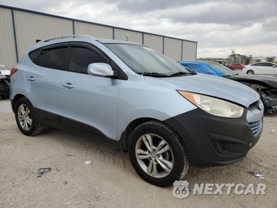 Czwarte zdjęcie samochodu z boku: 2011 HYUNDAI TUCSON GLS VIN:KM8JU3AC5BU193885 - miniatura