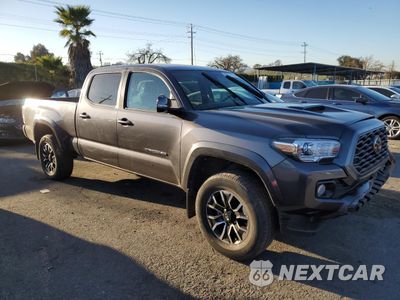Czwarte zdjęcie samochodu z boku: 2022 TOYOTA TACOMA DOUBLE CAB VIN:3TYDZ5BN2NT016951 - miniatura