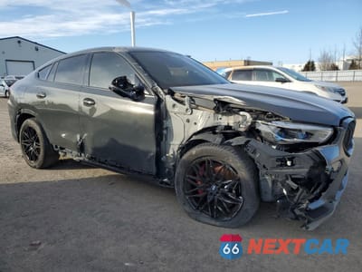 Czwarte zdjęcie samochodu z boku: 2022 BMW X6 M VIN:5YMCY0C04N9K70845 - miniatura