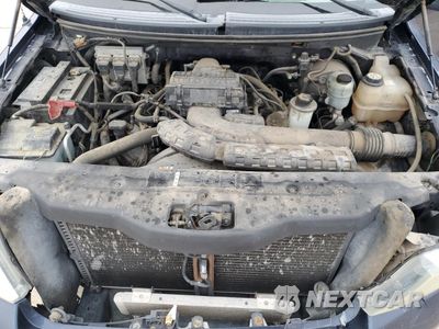 Zdjęcie 12 z 14 samochodu: 2005 FORD F150 VIN:1FTPF12535NA14352 - miniatura