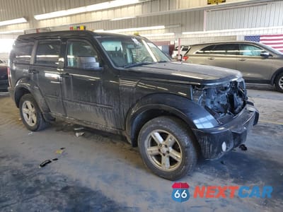Czwarte zdjęcie samochodu z boku: 2010 DODGE NITRO SXT VIN:1D4PU5GK6AW108857 - miniatura