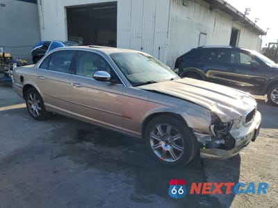 Czwarte zdjęcie samochodu z boku: 2004 JAGUAR VANDENPLAS VIN:SAJEA74C84SG03857 - miniatura