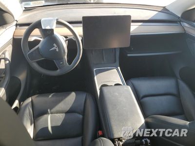 Zdjęcie 8 z 12 samochodu: 2023 TESLA MODEL Y VIN:7SAYGDEE6PF705569 - miniatura