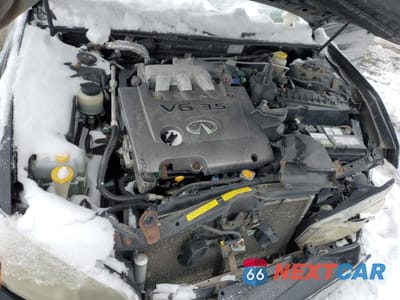 Zdjęcie 13 z 14 samochodu: 2002 INFINITI I35 VIN:JNKDA31A62T005713 - miniatura