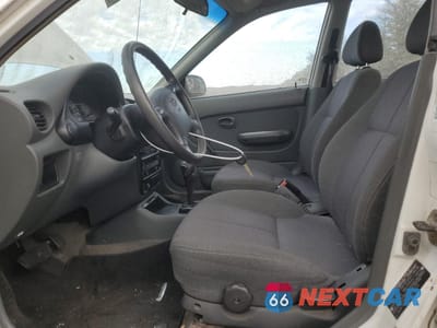 Zdjęcie 7 z 12 samochodu: 1999 HYUNDAI ACCENT GL VIN:KMHVF24N6XU566295 - miniatura