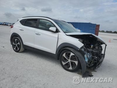 Czwarte zdjęcie samochodu z boku: 2016 HYUNDAI TUCSON LIMITED VIN:KM8J33A25GU161682 - miniatura