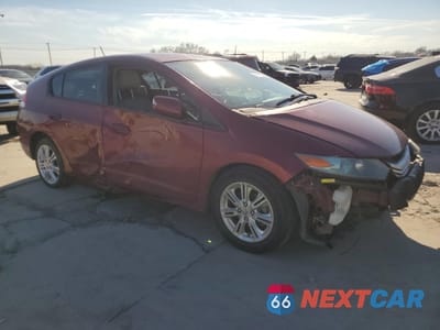 Czwarte zdjęcie samochodu z boku: 2010 HONDA INSIGHT EX VIN:JHMZE2H78AS009247 - miniatura