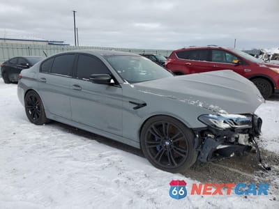 Czwarte zdjęcie samochodu z boku: 2021 BMW M5 VIN:WBS83CH07MCH20153 - miniatura