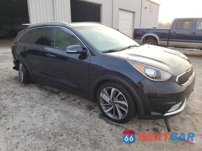 Czwarte zdjęcie samochodu z boku: 2017 KIA NIRO EX TOURING VIN:KNDCE3LC1H5040222 - miniatura