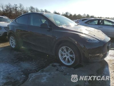 Czwarte zdjęcie samochodu z boku: 2023 TESLA MODEL Y VIN:7SAYGDEE6PF705569 - miniatura