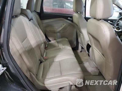 Zdjęcie 11 z 13 samochodu: 2014 FORD ESCAPE TITANIUM VIN:1FMCU0J93EUB61503 - miniatura