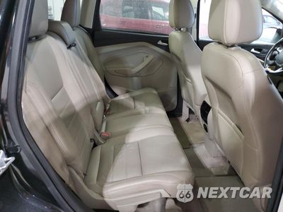 Zdjęcie 12 z 15 samochodu: 2014 FORD ESCAPE TITANIUM VIN:1FMCU0J93EUB61503 - miniatura